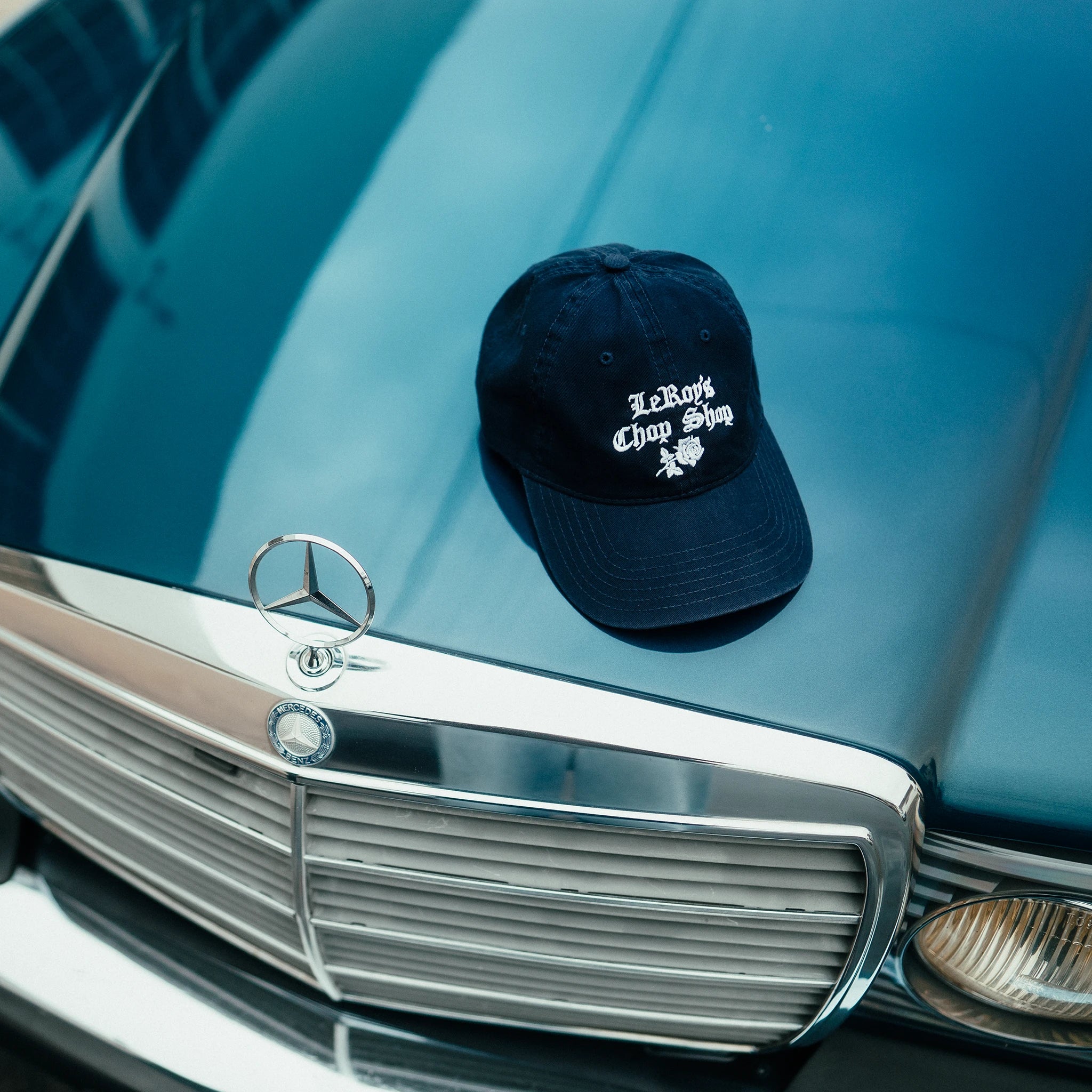 Gorra de papá azul marino bordada de LeRoy's Chop Shop